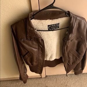 Dark brown leather jacket with fur inside